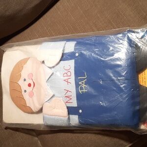Soft sided zippered carry bag. Big soft floppy doll filled with ABC pill…